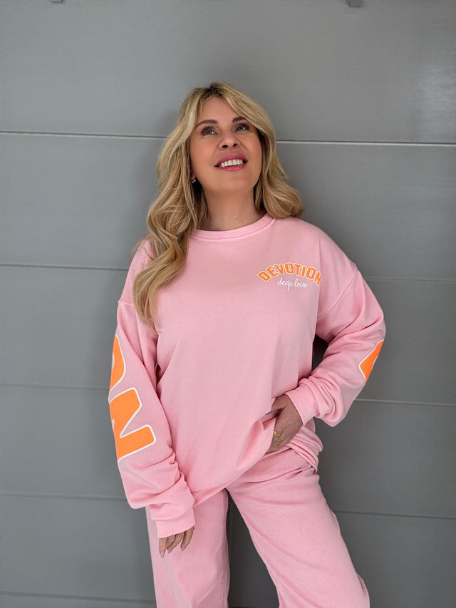 Sweater DEVOTION mit Rückenprint rosa/orange