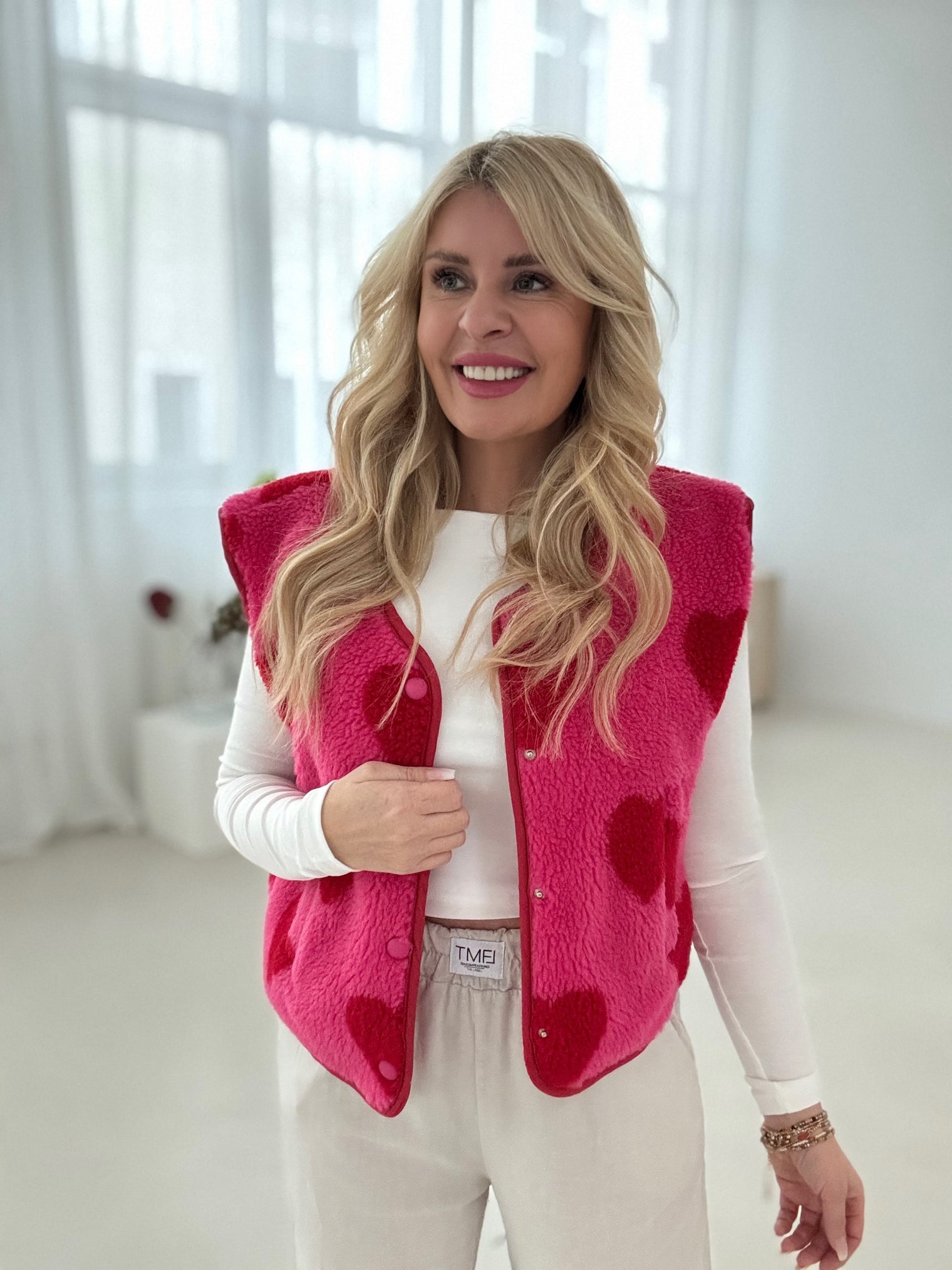 Teddy Weste pink mit Herzen in rot