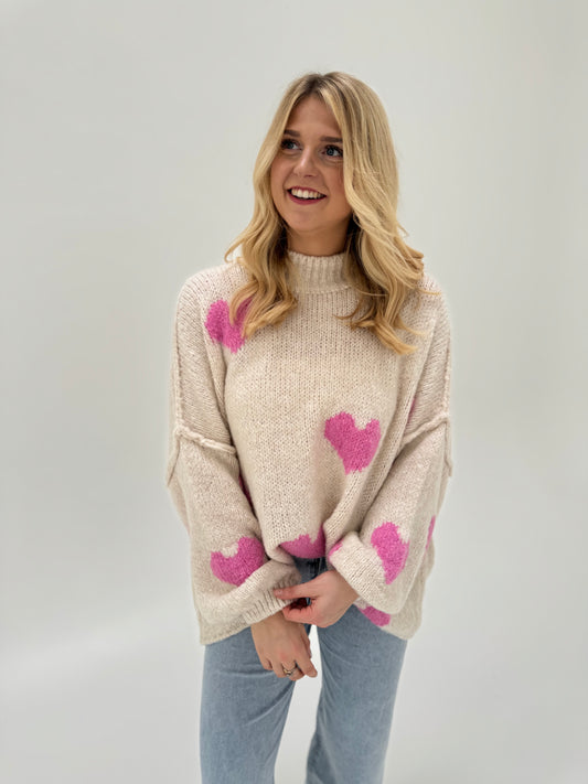 Kuschelweicher Pullover cremeweiß mit rosa Herzen