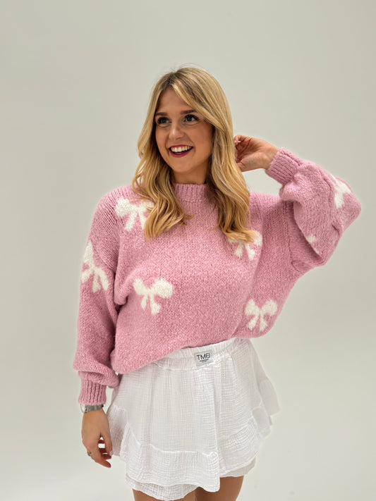 Kuschelweicher Pullover rosa mit weißen Schleifen