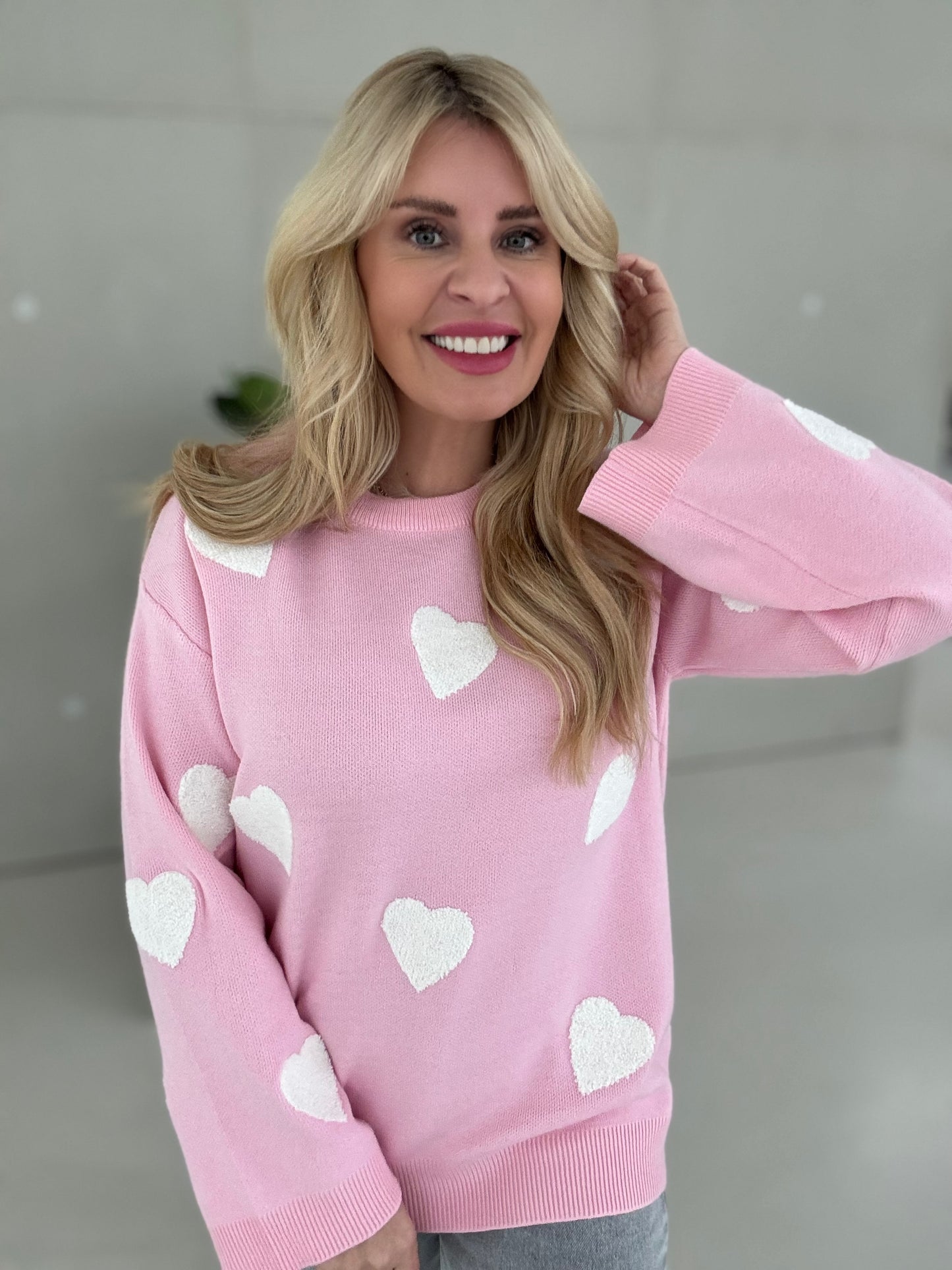 Oversize Feinstrick Pullover rosa mit weißen Frotteeherzen