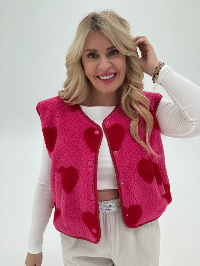 Teddy Weste pink mit Herzen in rot