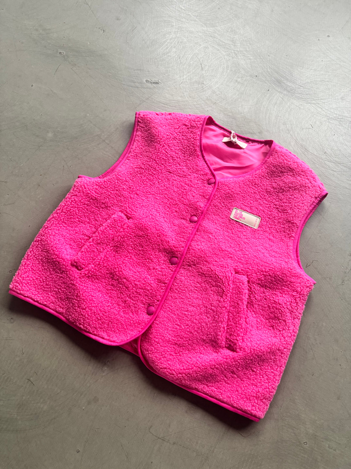 Teddy Weste mit Druckknöpfen & Patch BE THE REASON FOR SMILES TODAY pink